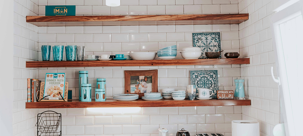 Personalize Small Kitchens with Decorative Cookbooks A small kitchen with neatly displayed cookbooks for added personality