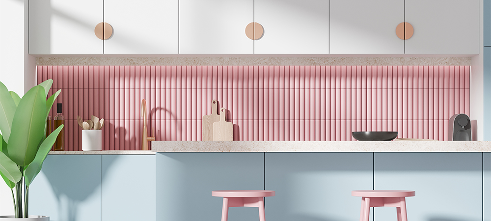 Modern kitchen with white cabinets, a blue island, and a pink beveled edge tile backsplash