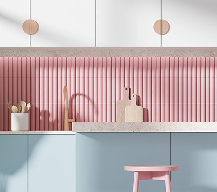 Modern kitchen with white cabinets, a blue island, and a pink beveled edge tile backsplash