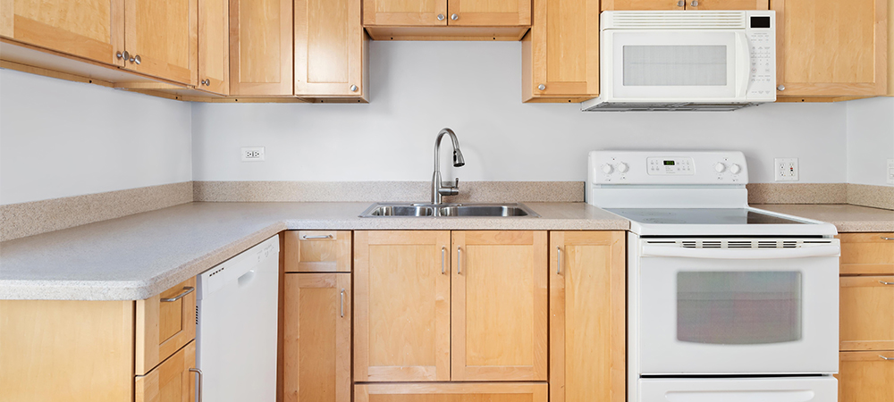 Earthy and Natural Kitchen Cabinet Colors for Warmth Kitchen featuring earthy and natural-colored cabinets for a warm ambiance