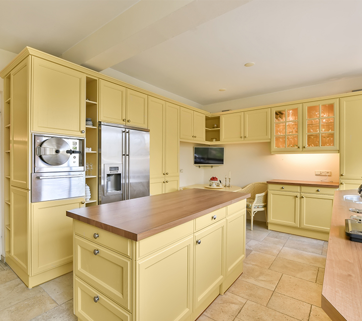 Bold Yellow Kitchen Cabinets for a Cheerful Space Vibrant kitchen featuring bold yellow cabinets for a lively atmosphere