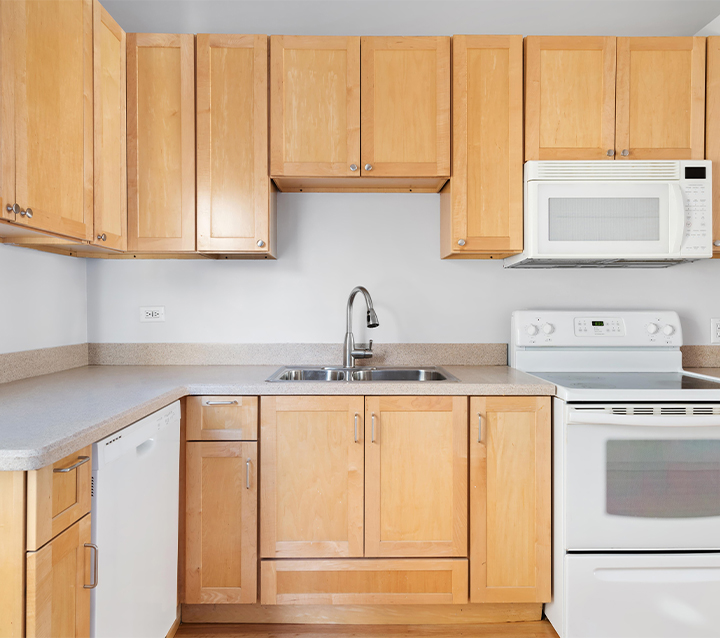Earthy and Natural Kitchen Cabinet Colors for Warmth Kitchen featuring earthy and natural-colored cabinets for a warm ambiance