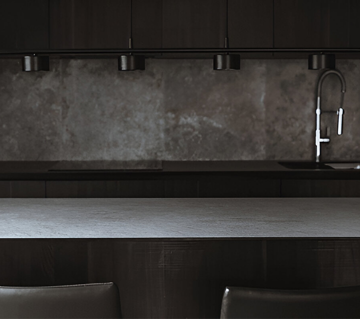 Moody Monochromatic Kitchen Color Schemes Kitchen with a moody monochromatic color scheme for a sleek modern design