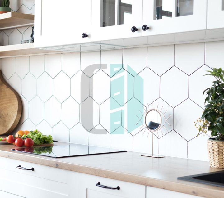 Modern kitchen featuring a geometric tile backsplash, creating a visually striking pattern