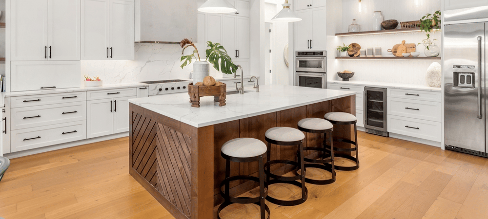 Coordinated kitchen island seating with matching stools, creating a cohesive and stylish look