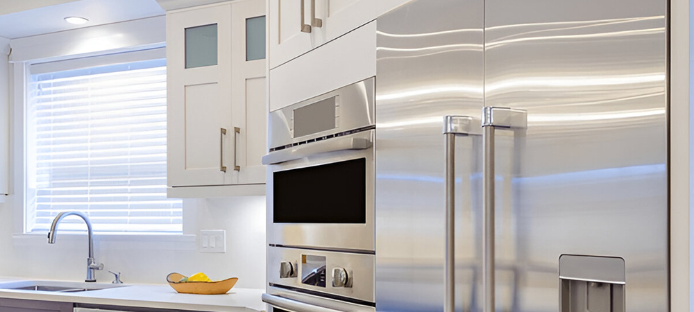 Kitchen with neutral tone cabinets creating a timeless and elegant look