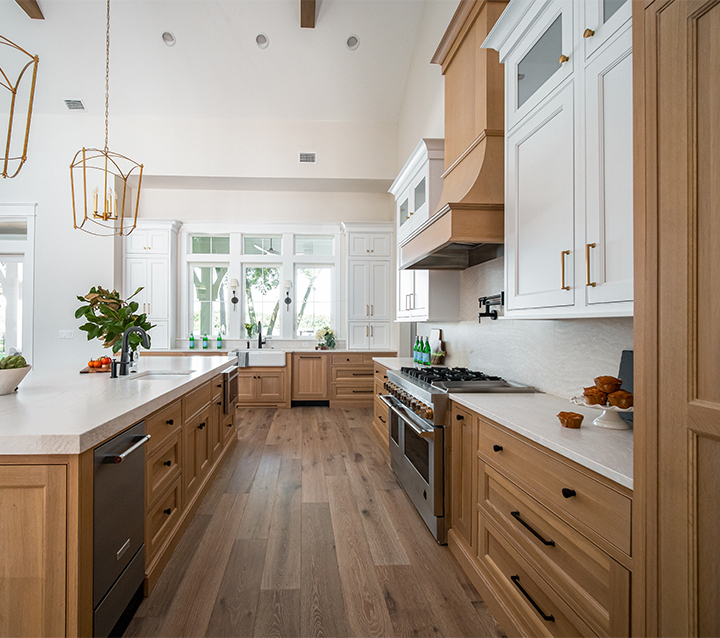 Kitchen with neutral tone cabinets creating a timeless and elegant look