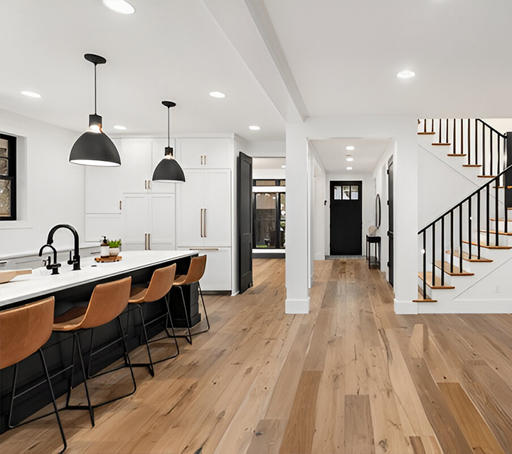 Kitchen with neutral tone cabinets creating a timeless and elegant look